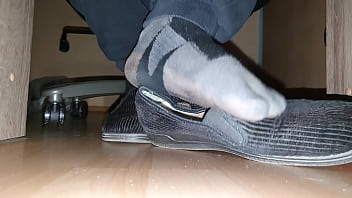 sniffing bosses feet under desk