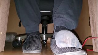 touching nosses feet under desk