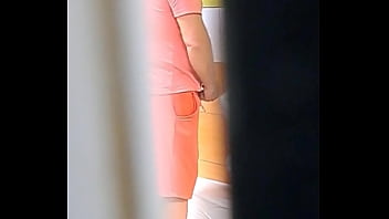 menwanking together in public toilet